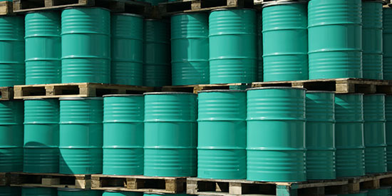 Photo of stacked oil barrels
