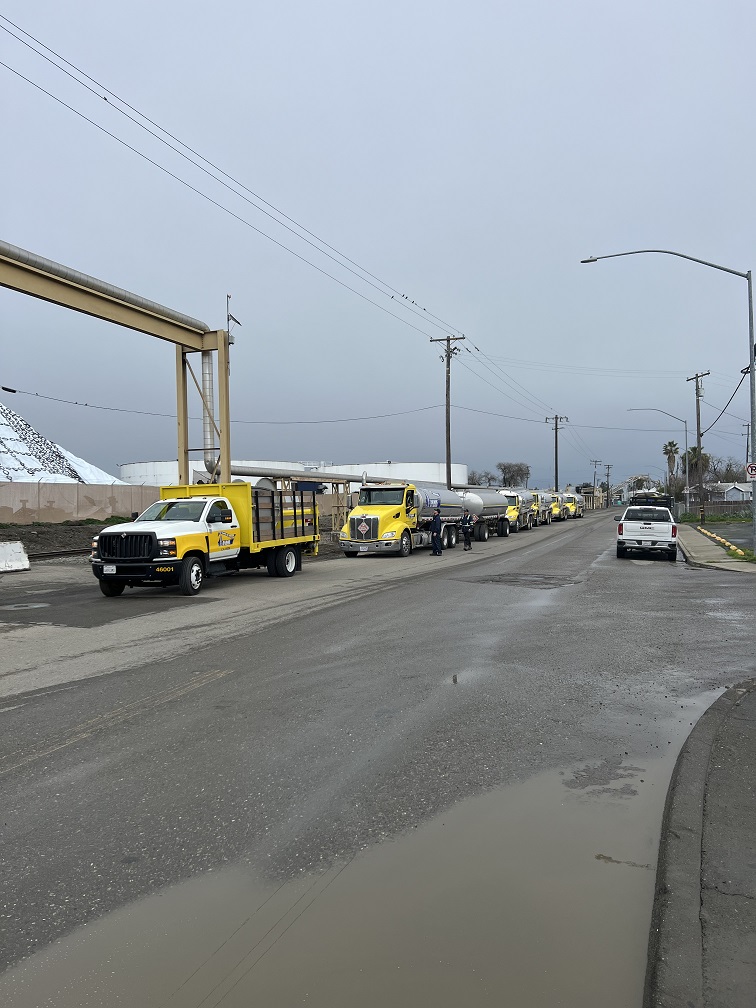 Line of Ramos oil trucks providing a bulk fuel delivery