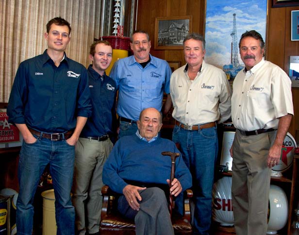 Photo of three generations of the Ramos Oil family