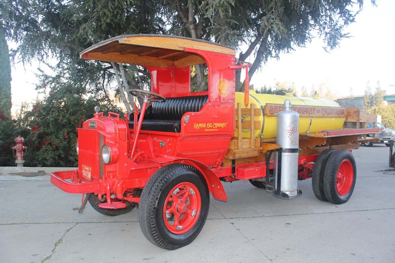 Photo of a vintage red Ramos Oil fuel truck